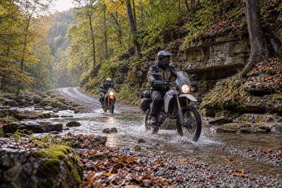Dual-sport riders crossing a rocky creek on the Tennessee Dirt Devil